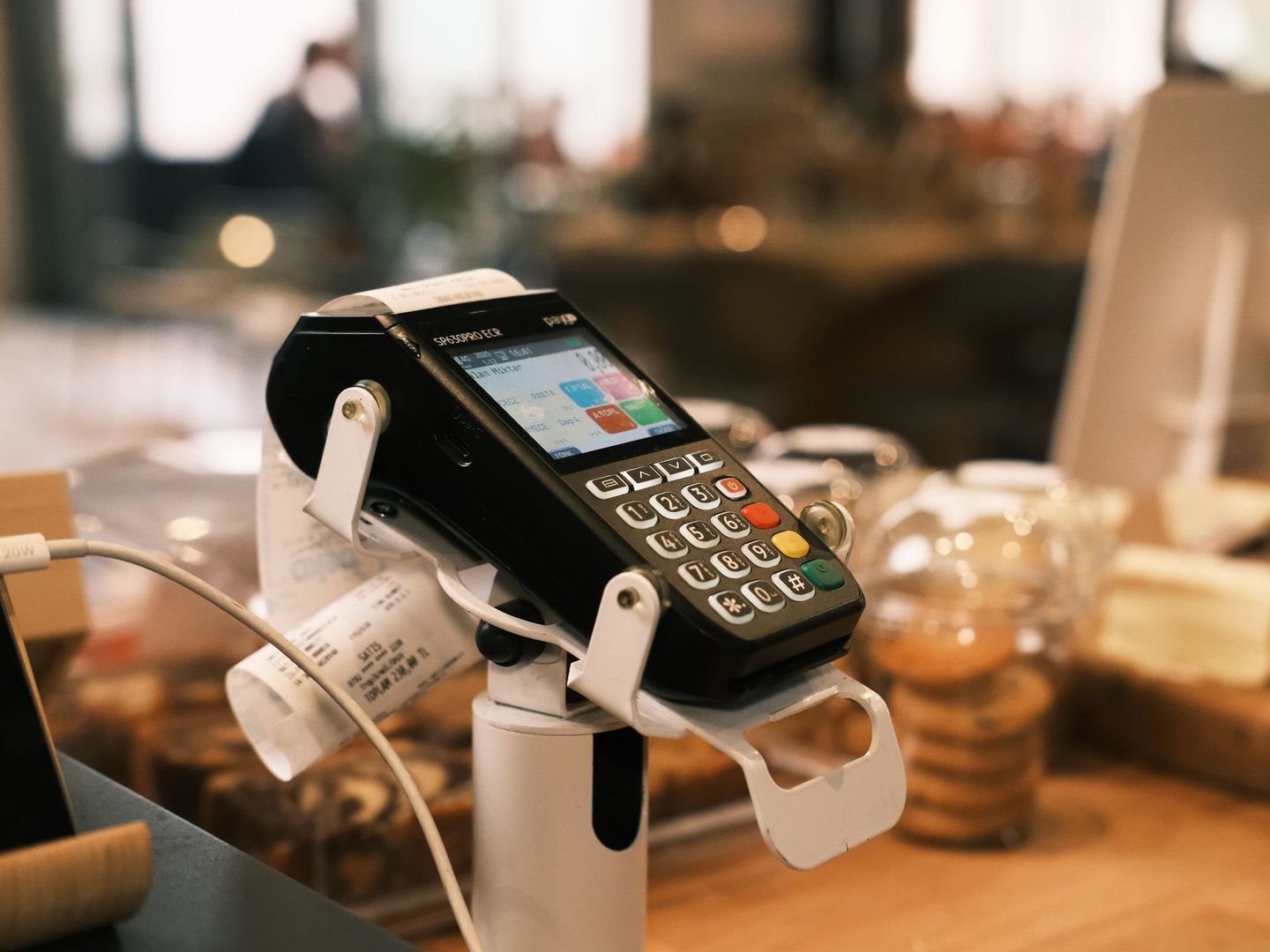A card terminal on a shop counter