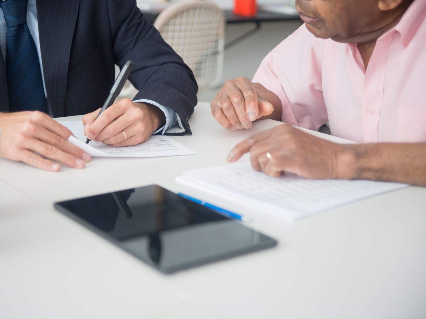 Two founders signing an agreement