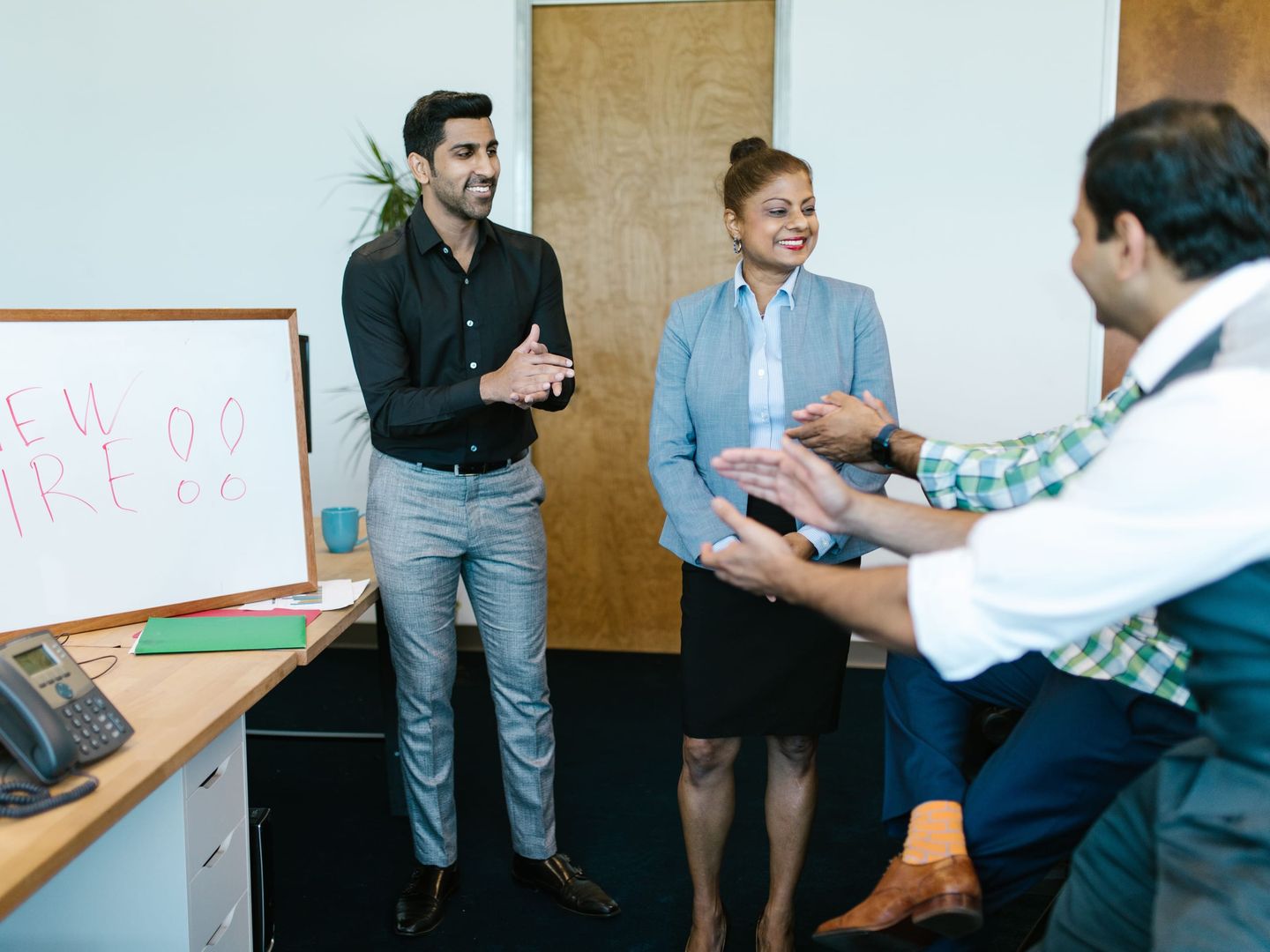 An HR manager onboarding new staff