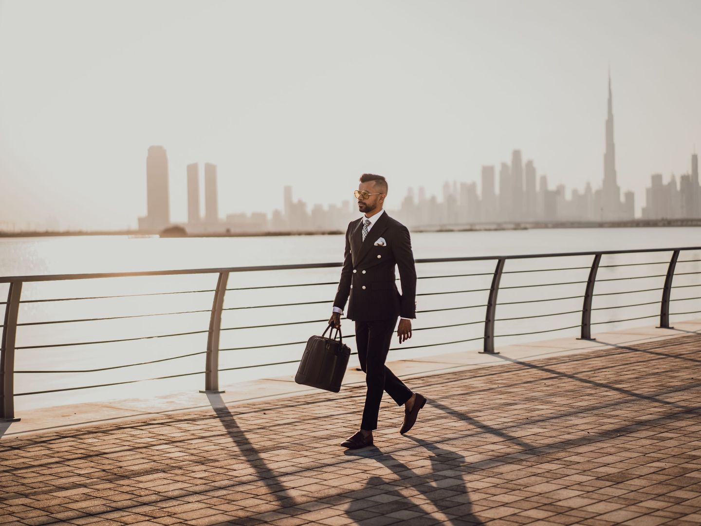 An executive walking through Dubai's business district